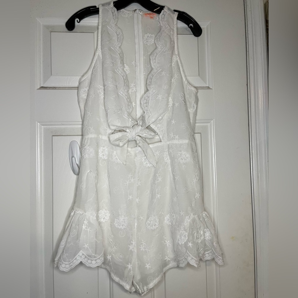 Solaris style white lace tie front romper with flutter hem size large